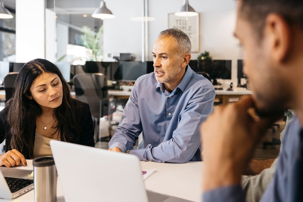 business-professionals-collaborating-in-an-open-pl-2026-01-11-10-53-02-utc